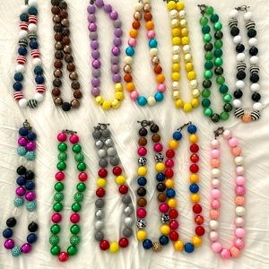 Set of 13 statement necklaces - large beads. Disney-style colors and themes.